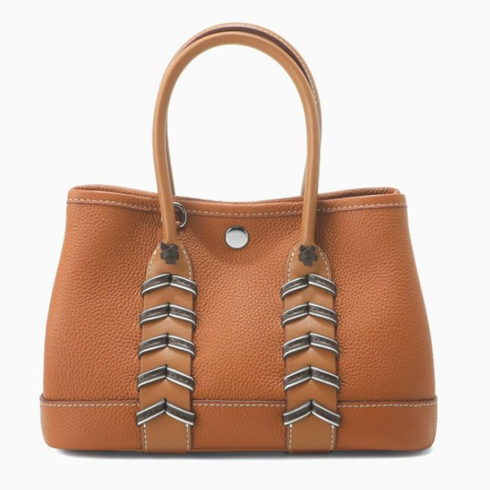 Luxury mini tote bag in orange pebbled calfskin with chevron Bredies strap detail