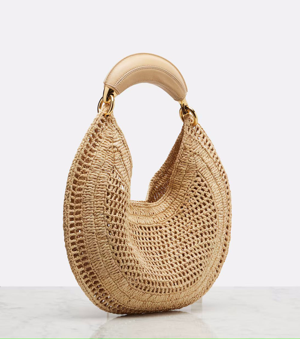 Handwoven raffia summer shoulder bag in beige with structured leather handle