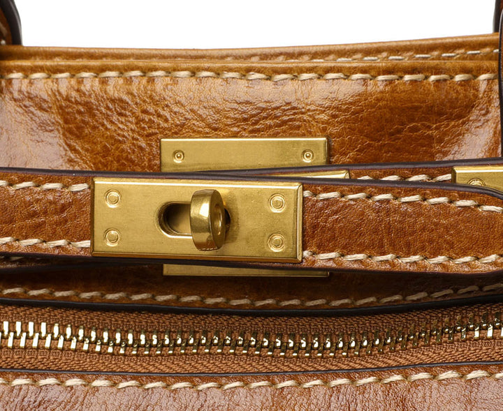 Italian leather bag with zip pocket and lock