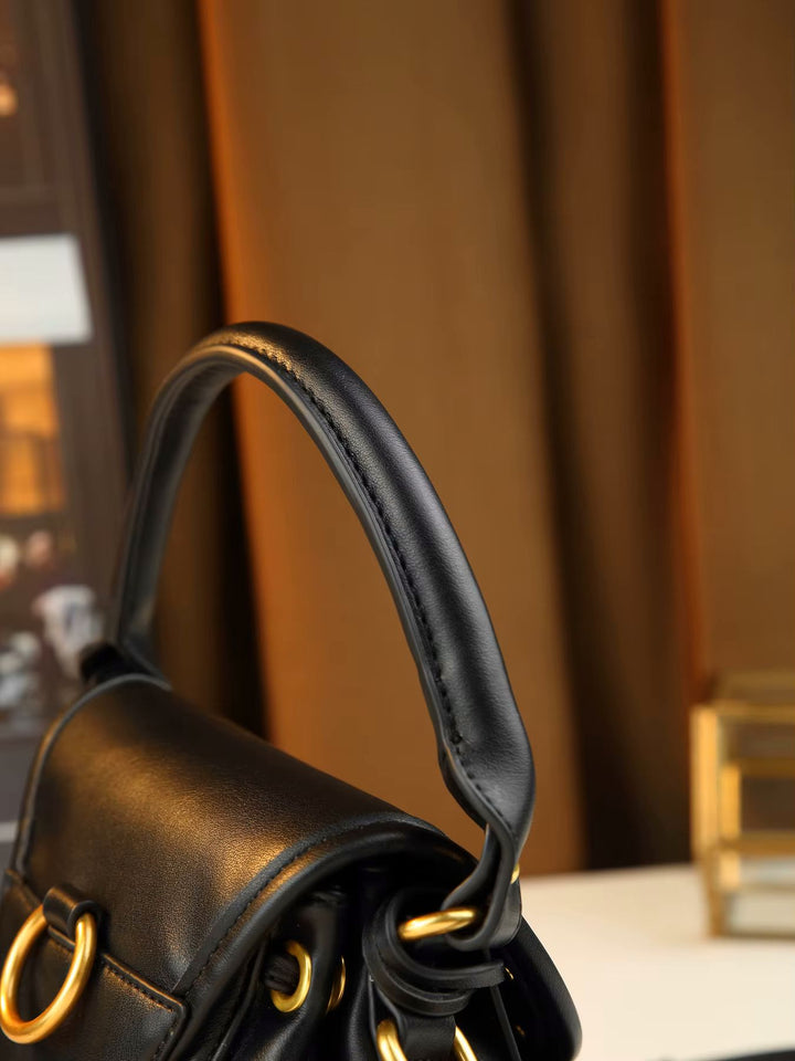 Black leather padlock shoulder bag with gold hardware and front