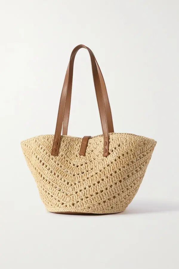 Panier raffia bag top view showing open unlined interior and decorative key holder clasp

