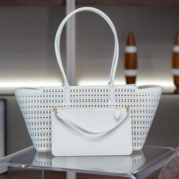 Bold cutout leather handbag for women