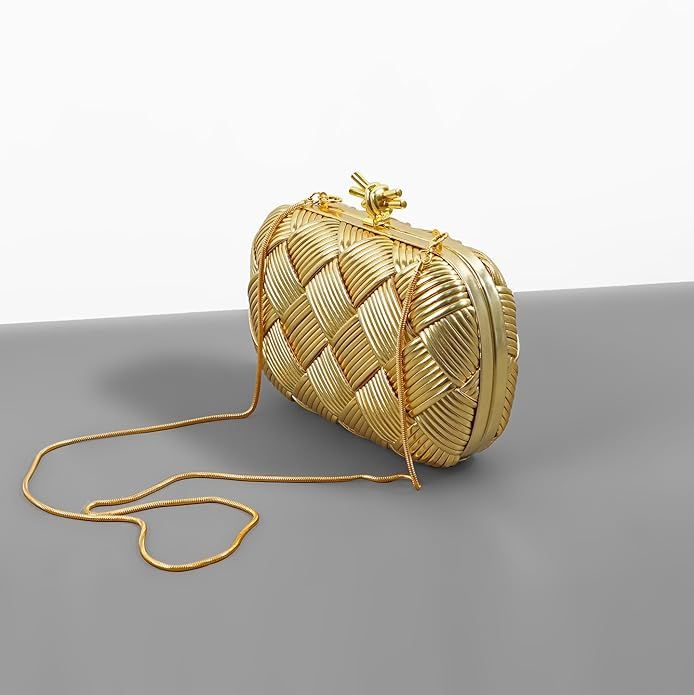 Gold woven handbag on a gray surface