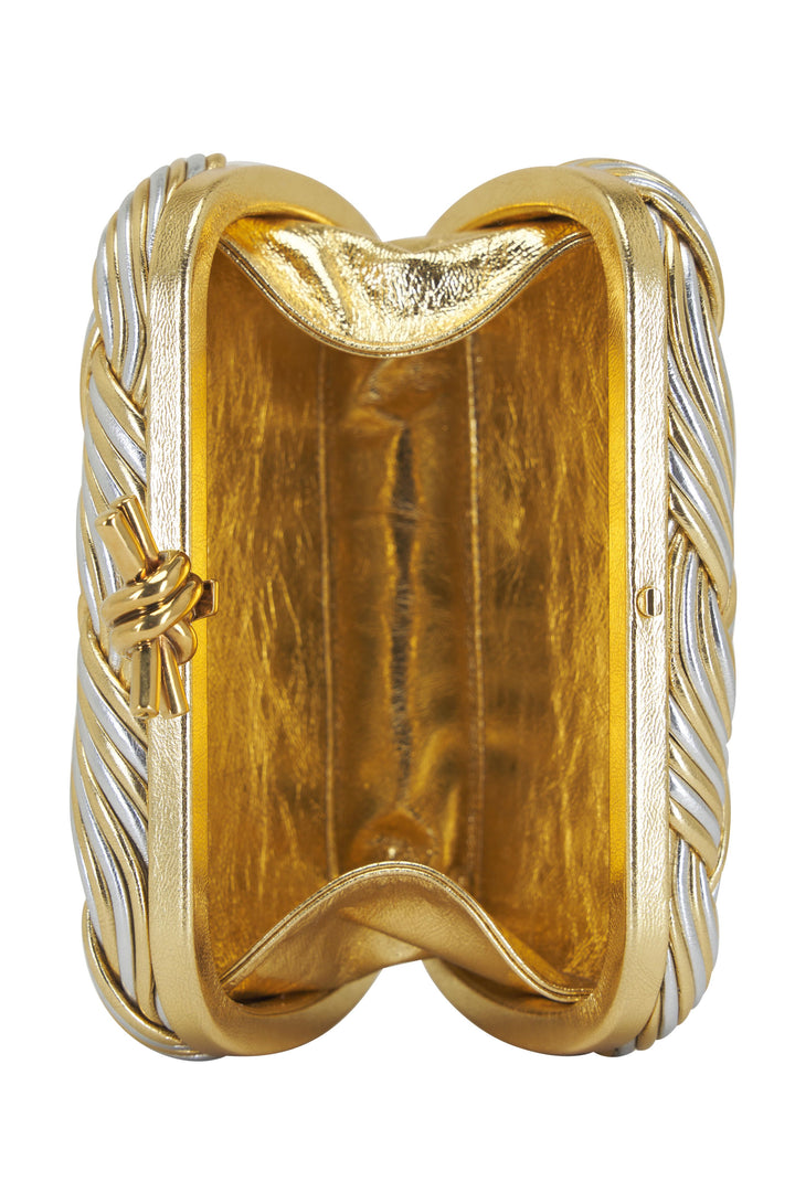 Gold ring with intricate design on a white background