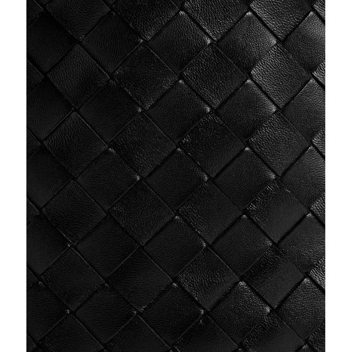Close-up of black woven leather texture