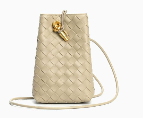 Luxury leather phone pouch close up showing intrecciato weave texture and gold hardware