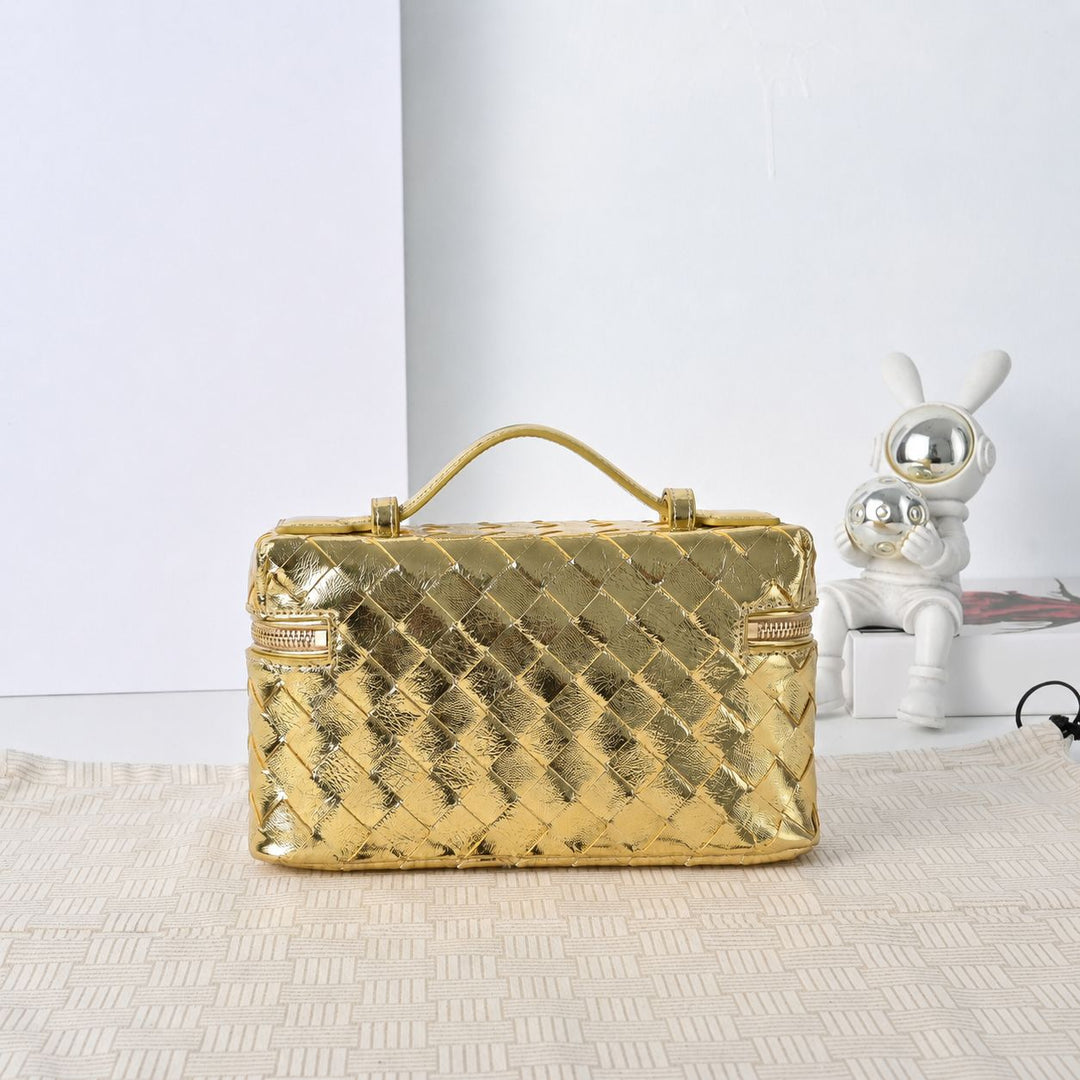 Namrico gold woven leather crossbody bag close-up of diamond weave texture and zip closure