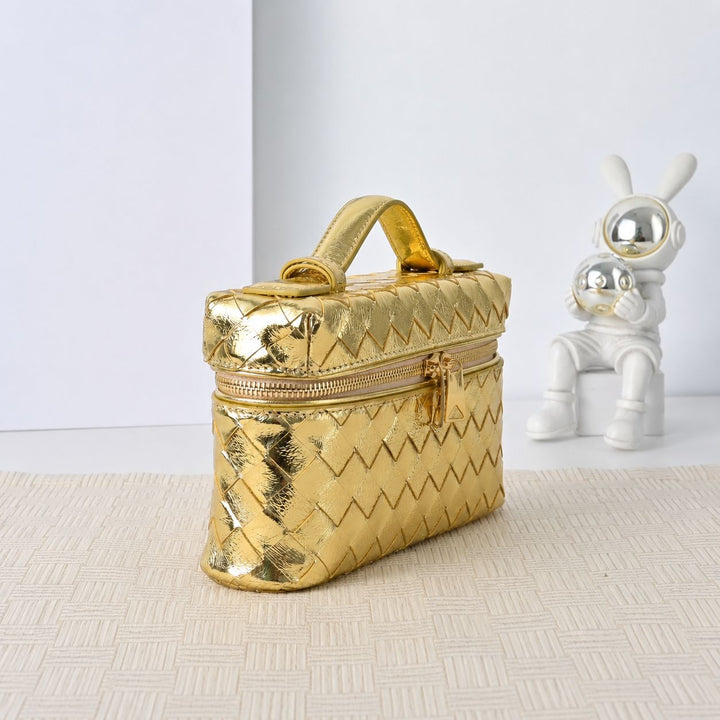 Gold leather woven crossbody bag angle view highlighting full-surface diamond weave pattern
