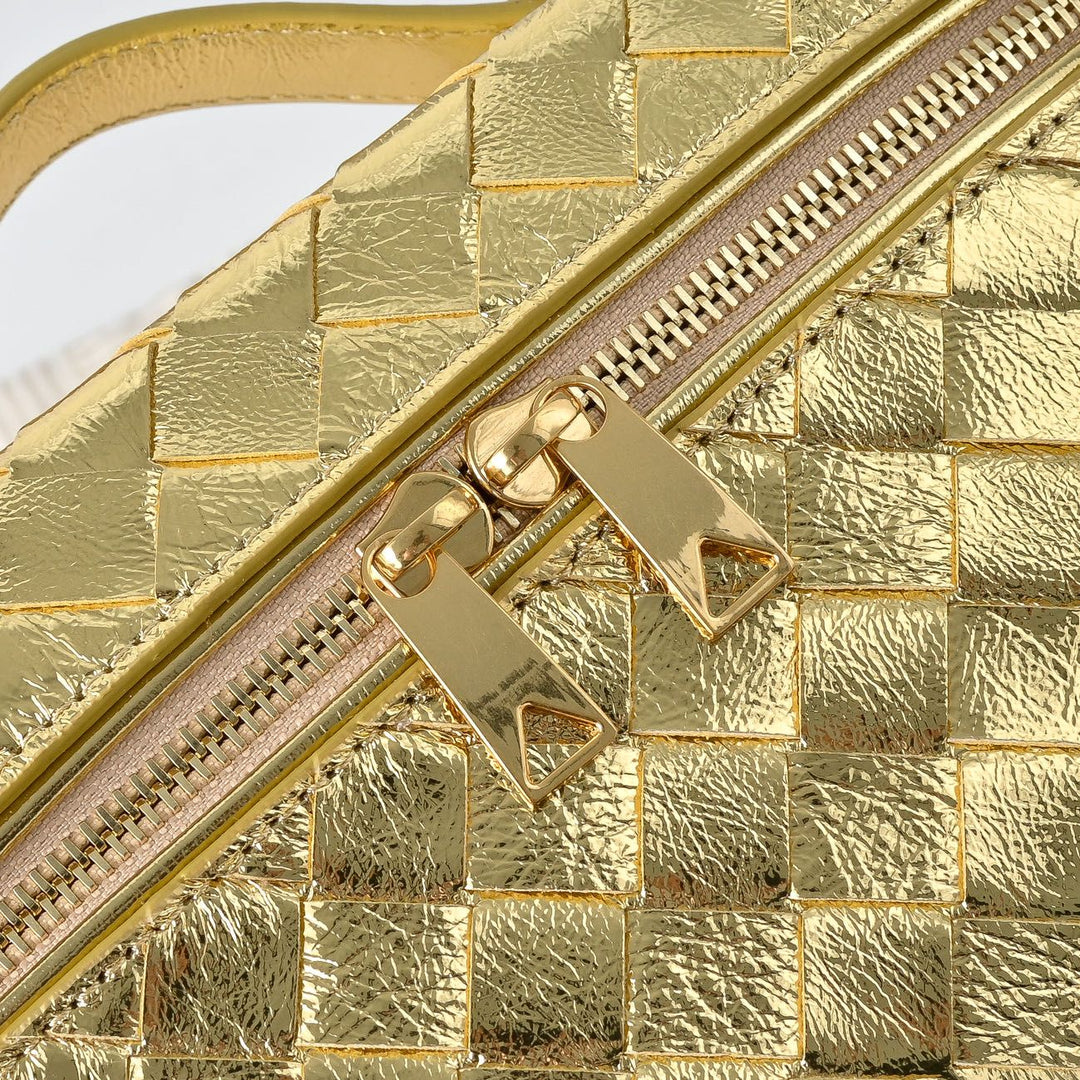 Gold metallic diamond weave leather bag close-up of butterfly lock clasp detail
