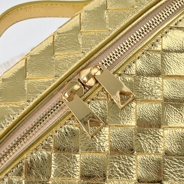 Gold metallic diamond weave leather bag close-up of butterfly lock clasp detail